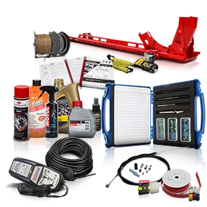 Various motorcycle workshop accessories such as oils, cables, diagnostic devices, and tools.